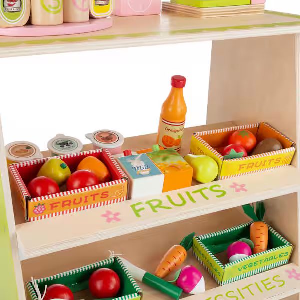 Wooden play grocery market stand with crates of pretend fruit, vegetables and milk
